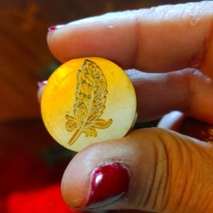 Wax stamp head, feather